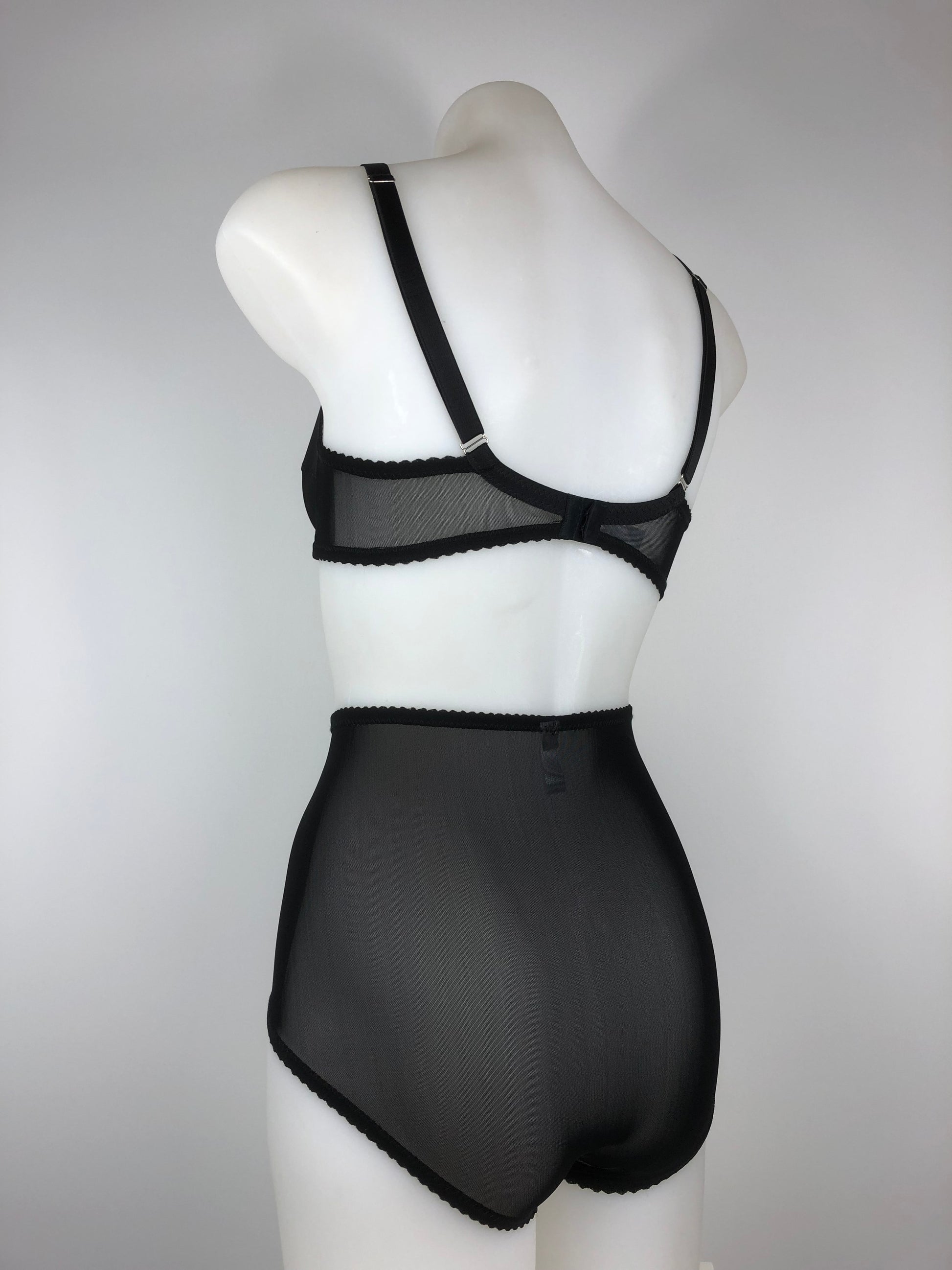 Sheer see through black mesh pantie girdle. High waisted knicker brief. Transparent fetish bettie page pin up inspired lingerie underwear. Girdlette, soft bra and underwired corselette also available