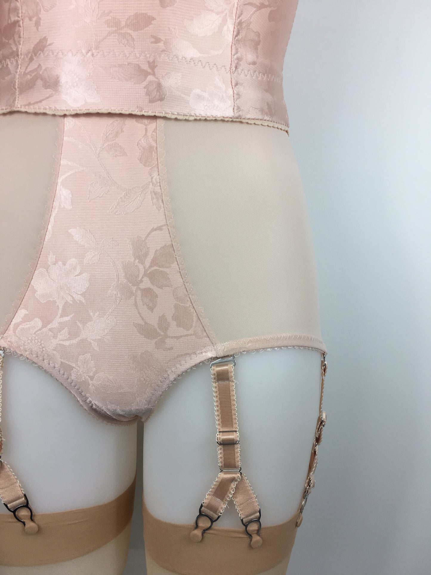Our most authentic looking vintage inspired lingerie yet. Perfect peachy satin pantie girdle or high waisted knicker with 6 detachable Y straps, characteristic of pip and pantalaimon. Nude big shapewear knickers with garter straps to keep your seamed stockings in place all day. Fabulous faux and reproduction lingerie made in the uk
