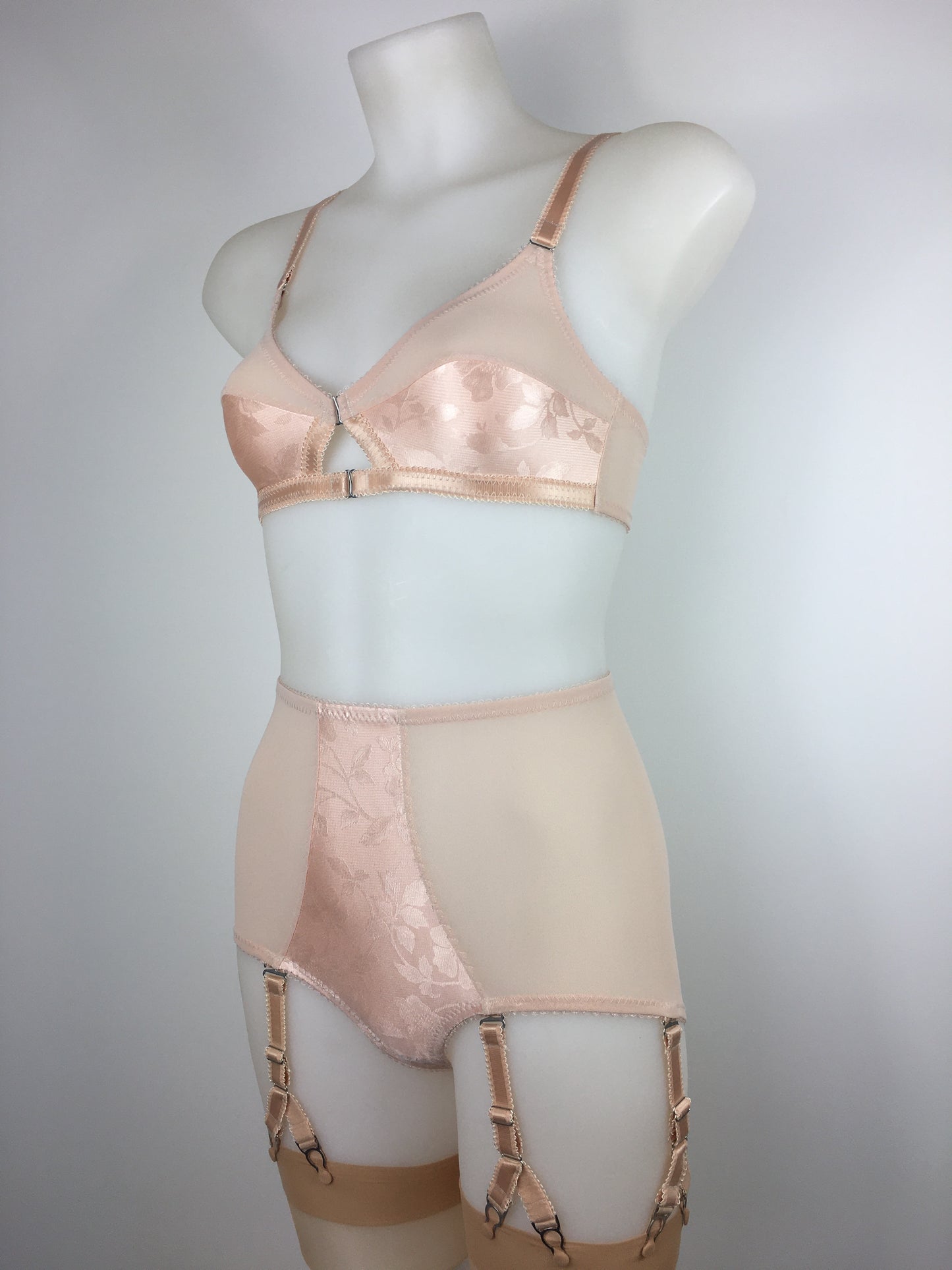 Our most authentic looking vintage inspired lingerie yet. Perfect peachy satin pantie girdle or high waisted knicker with 6 detachable Y straps, characteristic of pip and pantalaimon. Nude big shapewear knickers with garter straps to keep your seamed stockings in place all day. Fabulous faux and reproduction lingerie made in the uk