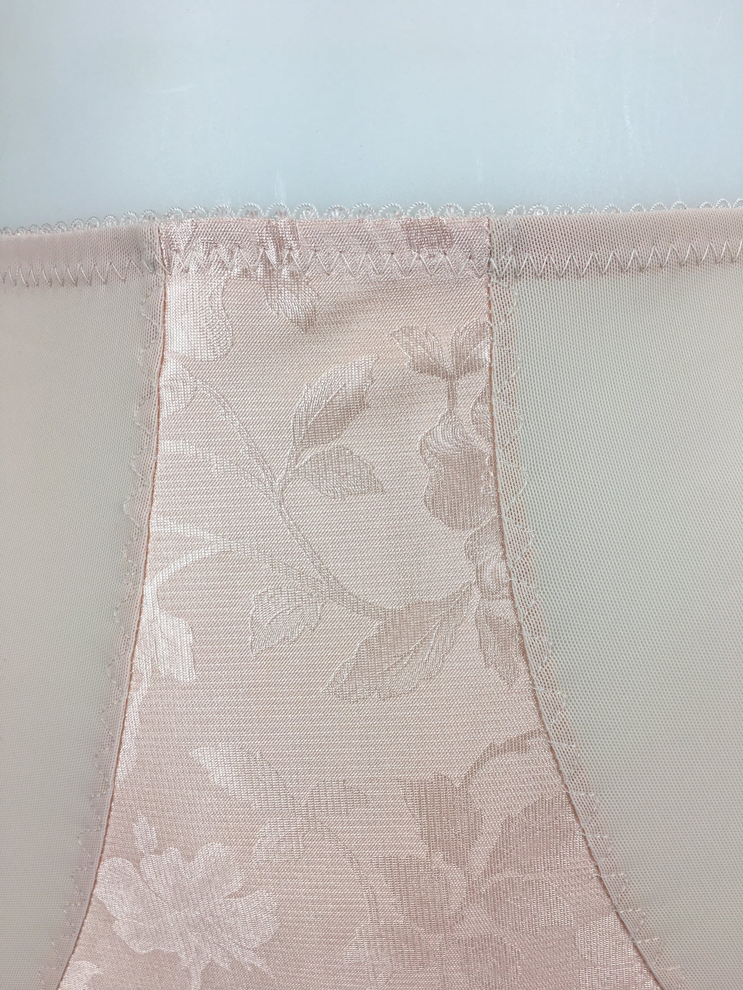 Our most authentic looking vintage inspired lingerie yet. Perfect peachy satin pantie knicker to compliment the other faux vintage lingerie in the clematic range, including longline faux vintage 1950s bra, vintage inspired longline girdle, high waisted pantie girdle and size strap suspender belt