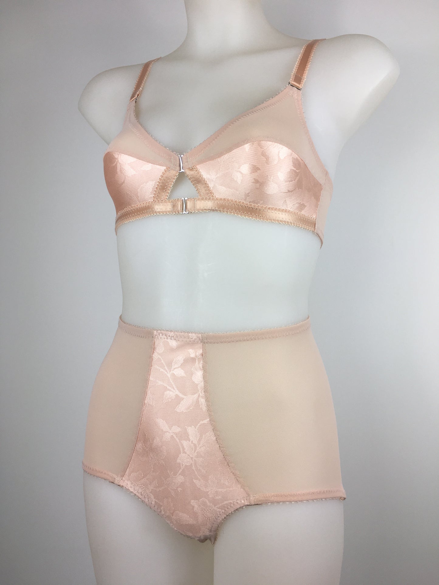 Our most authentic looking vintage inspired lingerie yet. Perfect peachy satin pantie knicker to compliment the other faux vintage lingerie in the clematic range, including longline faux vintage 1950s bra, vintage inspired longline girdle, high waisted pantie girdle and size strap suspender belt