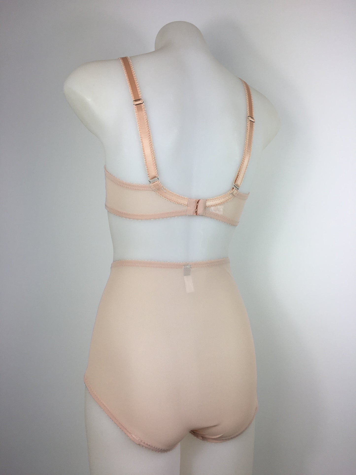 Our most authentic looking vintage inspired lingerie yet. Perfect peachy satin pantie knicker to compliment the other faux vintage lingerie in the clematic range, including longline faux vintage 1950s bra, vintage inspired longline girdle, high waisted pantie girdle and size strap suspender belt