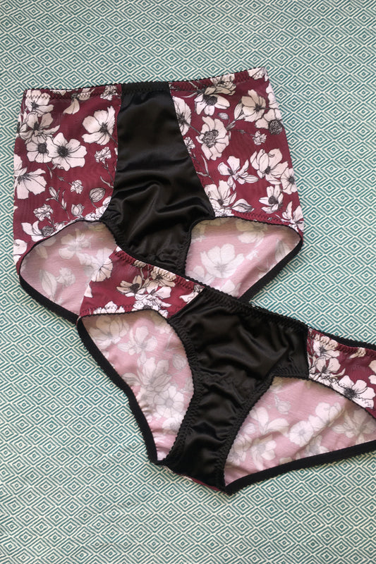 satin underwired corselette with wine cherry floral fabric. Six steel suspender straps and elastic waistband. shape wear lingerie by in the uk. vintage retro inspired lingerie and underwear by Pip & Pantalaimon with classic cut knickers and high waisted panties