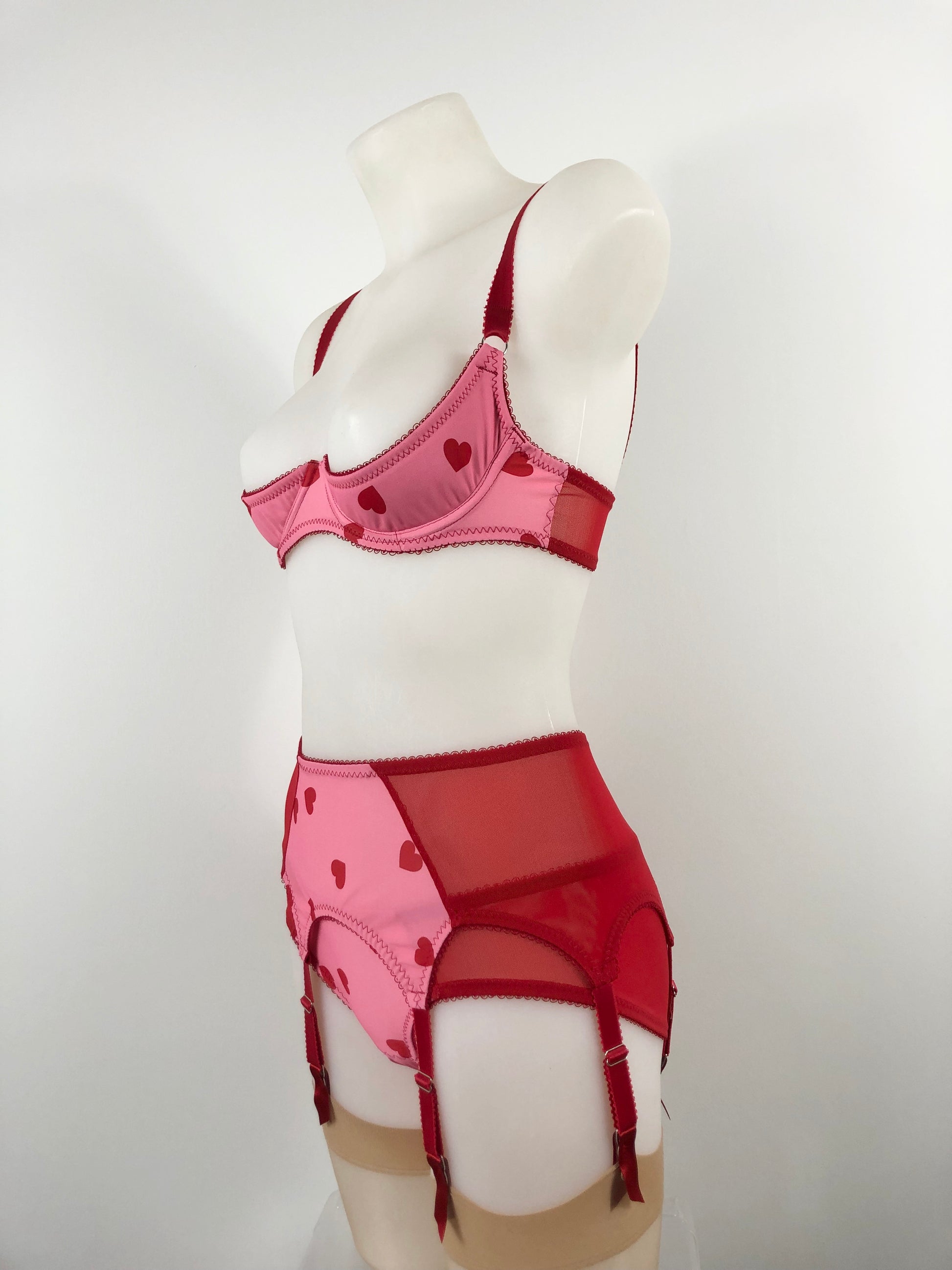 red and pink cheesecake heart lingerie. vintage inspired quarter cup shelf bra with pink heart front and red mesh sides, perfect for valentines cheesecake pin ups,  A fun, bold, playful retro inspired underwear set