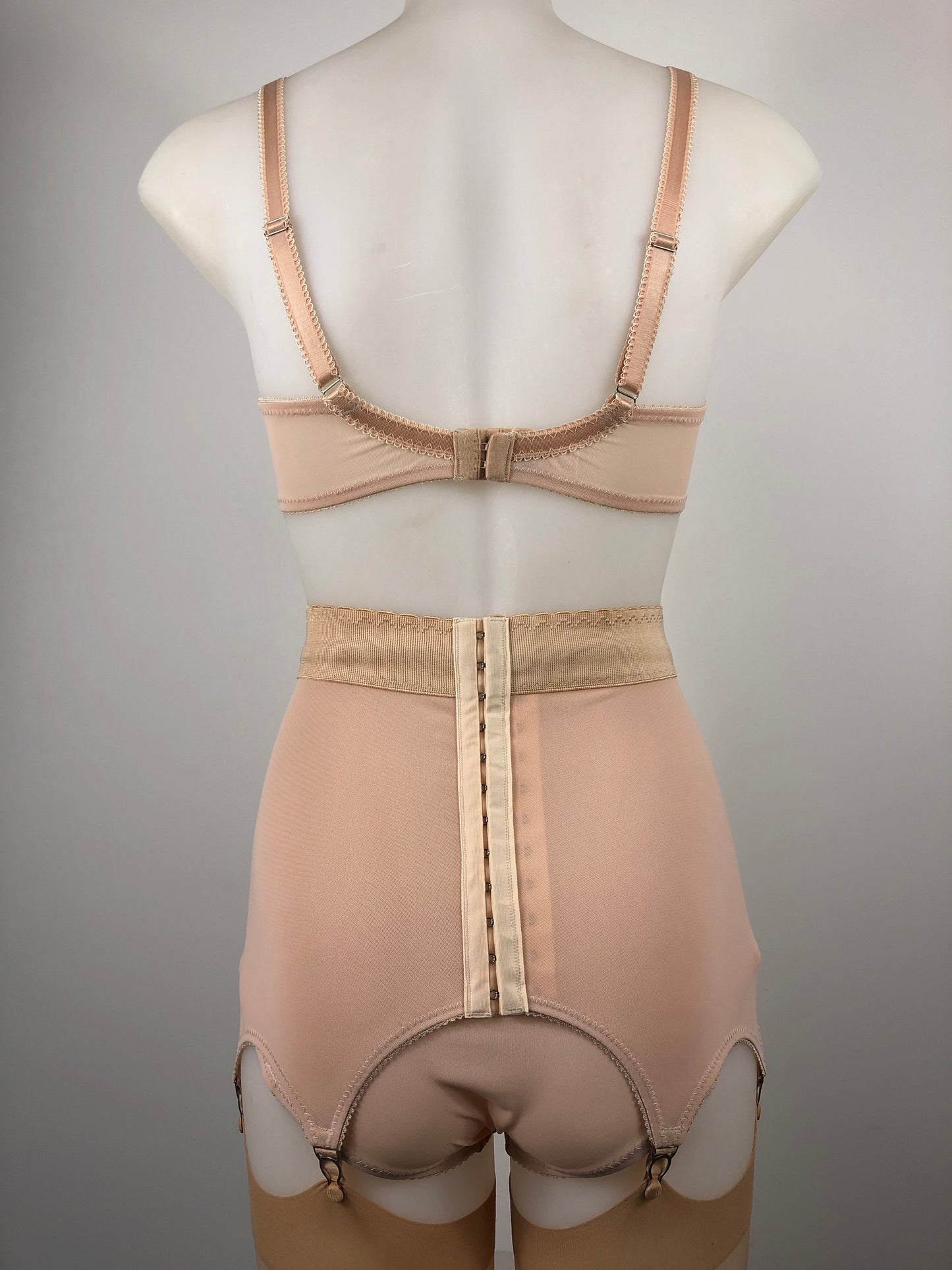 Peachy Beige lace lingerie. 1950s nude faux vintage underwear range odette. Offering longline bra, longline girdle, 6 strap garter belt and pantie girdle high waisted knickers with detachable suspender straps