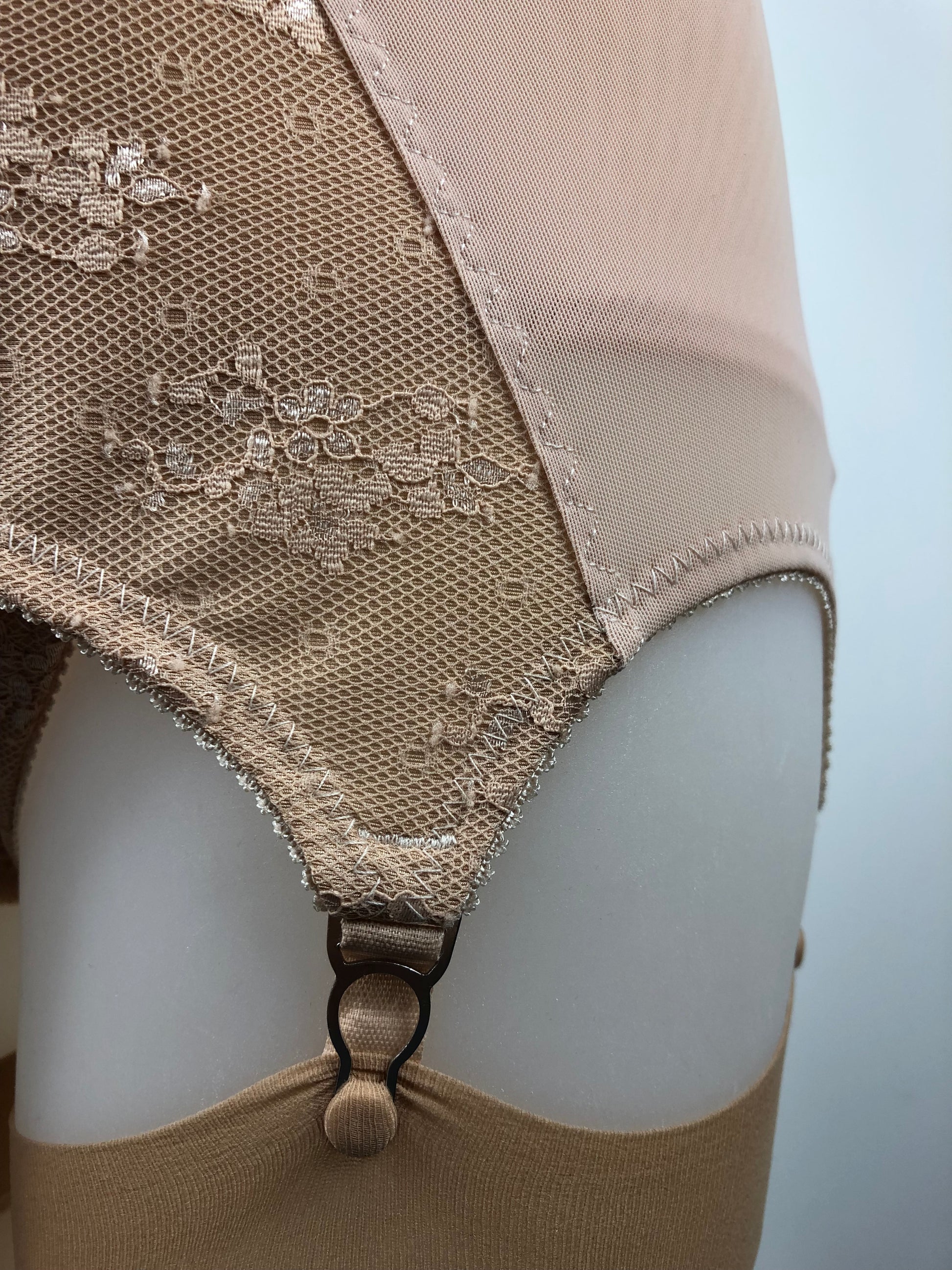 Peachy Beige lace lingerie. 1950s nude faux vintage underwear range odette. Offering longline bra, longline girdle, 6 strap garter belt and pantie girdle high waisted knickers with detachable suspender straps