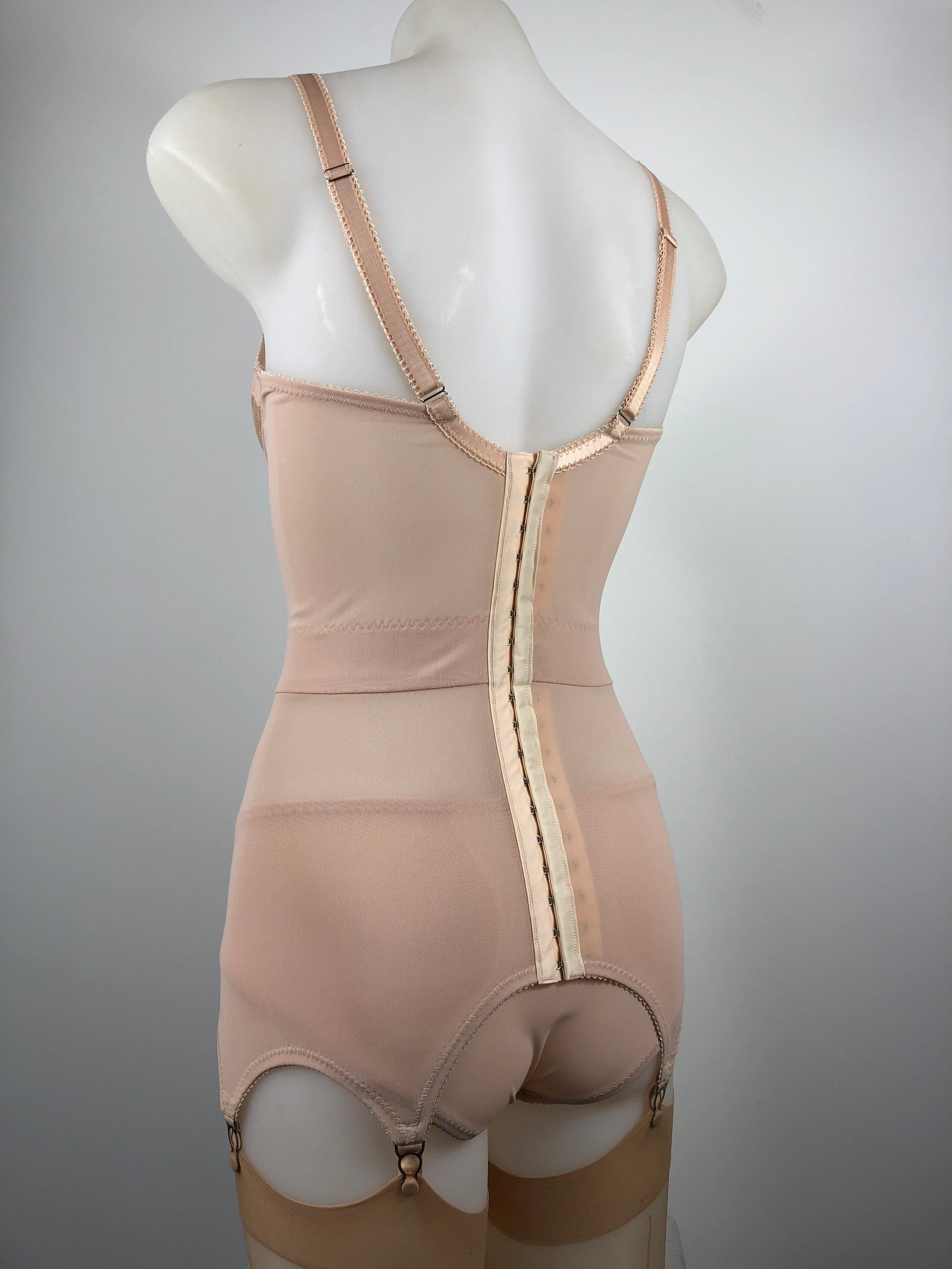 Peachy Beige lace lingerie. 1950s nude faux vintage underwear range odette. Offering longline bra, longline girdle, 6 strap garter belt and pantie girdle high waisted knickers with detachable suspender straps