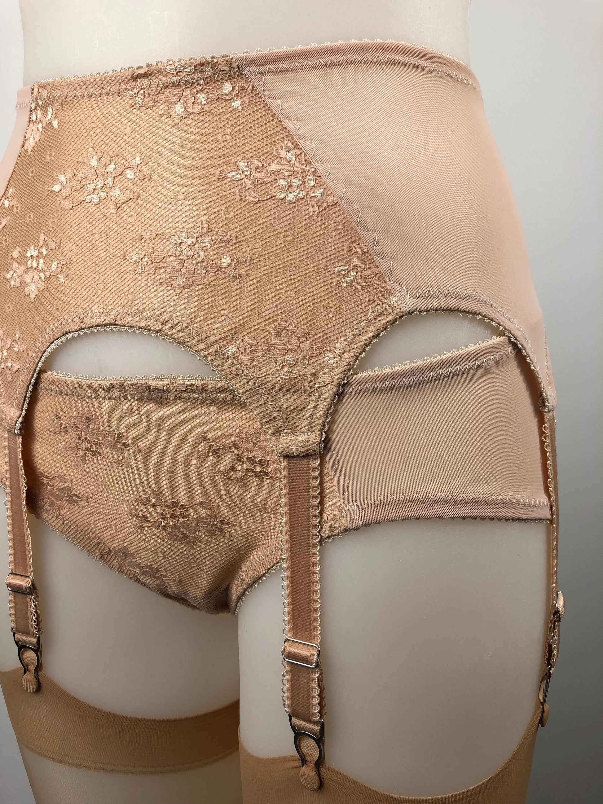 Peachy Beige lace lingerie. 1950s nude faux vintage underwear range odette. Offering longline bra, longline girdle, 6 strap garter belt and pantie girdle high waisted knickers with detachable suspender straps