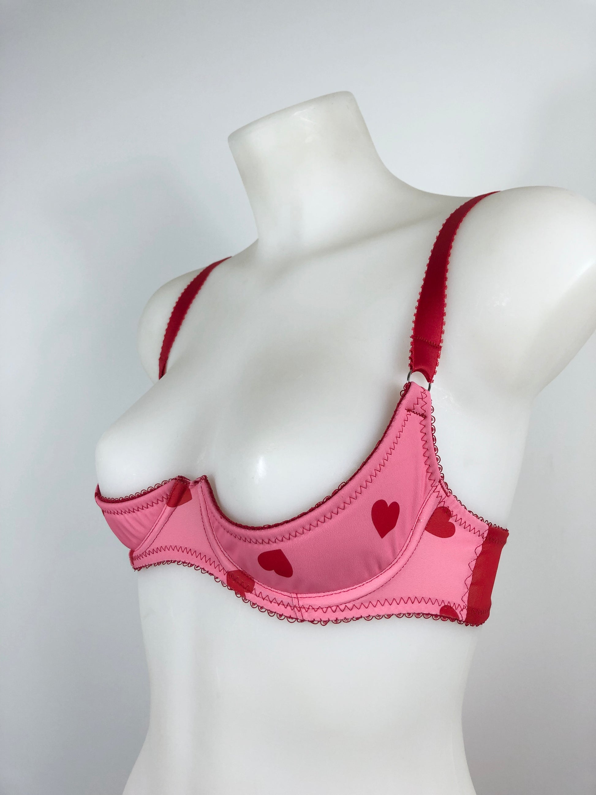 red and pink cheesecake heart lingerie. vintage inspired quarter cup shelf bra with pink heart front and red mesh sides, perfect for valentines cheesecake pin ups,  A fun, bold, playful retro inspired underwear set