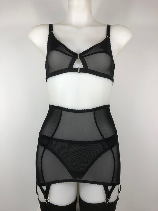 Sheer see through black mesh thong. Transparent fetish bettie page pin up inspired lingerie underwear. Girdlette, soft bra and underwired corselette also available