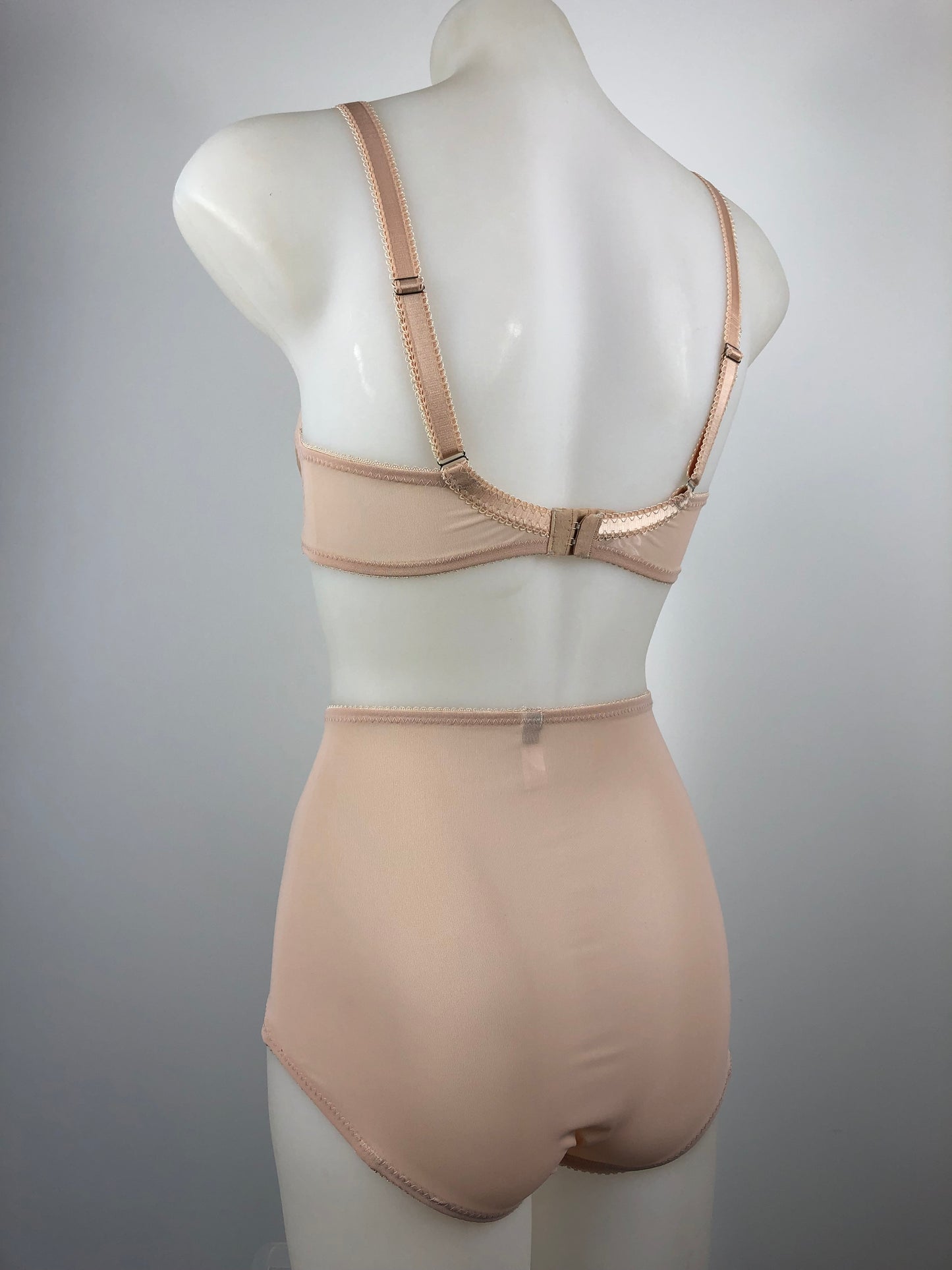 Peachy Beige lace lingerie. 1950s nude faux vintage underwear range odette. Offering longline bra, longline girdle, 6 strap garter belt and pantie girdle high waisted knickers with detachable suspender straps