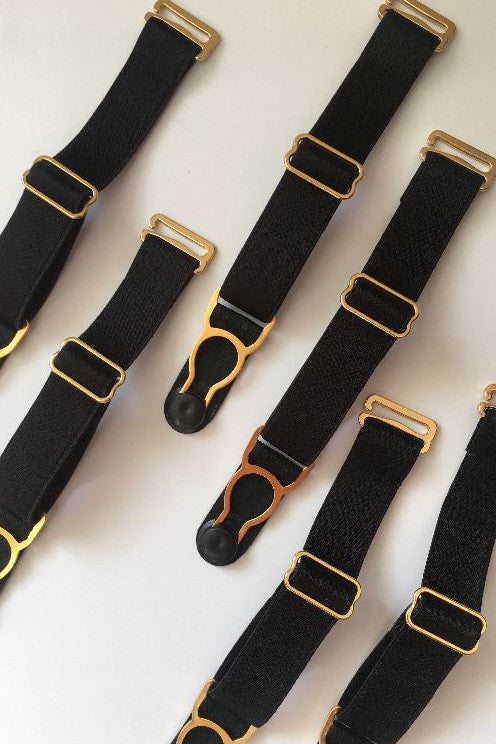 15mm black and gold detachable suspender straps (also known as garter straps) featuring sturdy, adjustable black elastic and strong pressed steel clips. Each strap has a hook at the top for attaching to loops on existing lingerie, ideal as replacements if original straps are lost.