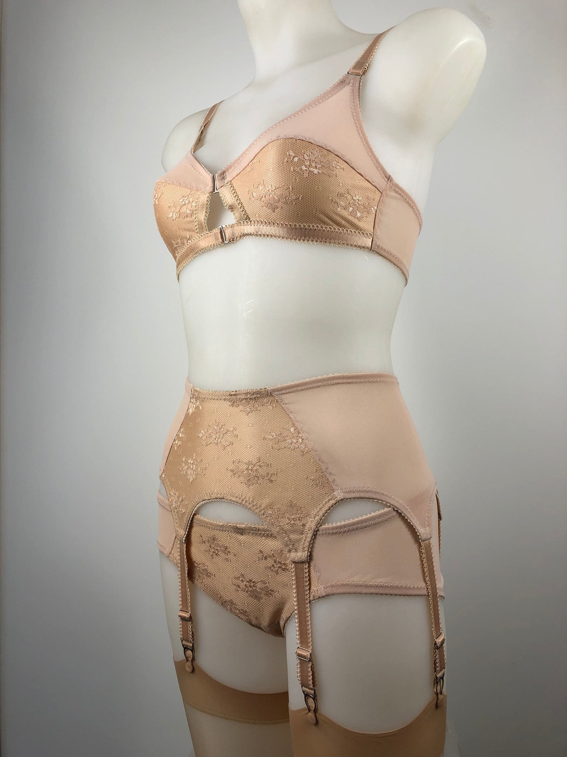 Peachy Beige lace lingerie. 1950s nude faux vintage underwear range odette. Offering longline bra, longline girdle, 6 strap garter belt and pantie girdle high waisted knickers with detachable suspender straps