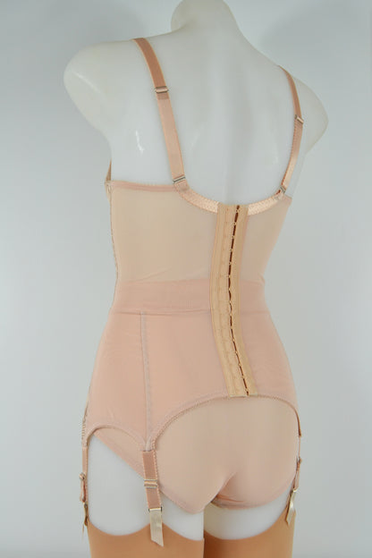 Biscotti corselette with vintage bullet bra inspired spiral stitching. Worn by a burlesque dancer, ideal showgirl lingerie costume. Bespoke lingerie made to measure in the UK 