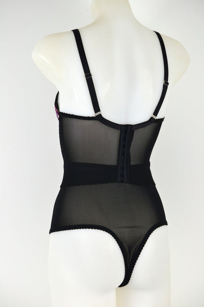 Black floral longline bra on a mannequin against a white background. vintage 1950s inspired underwear