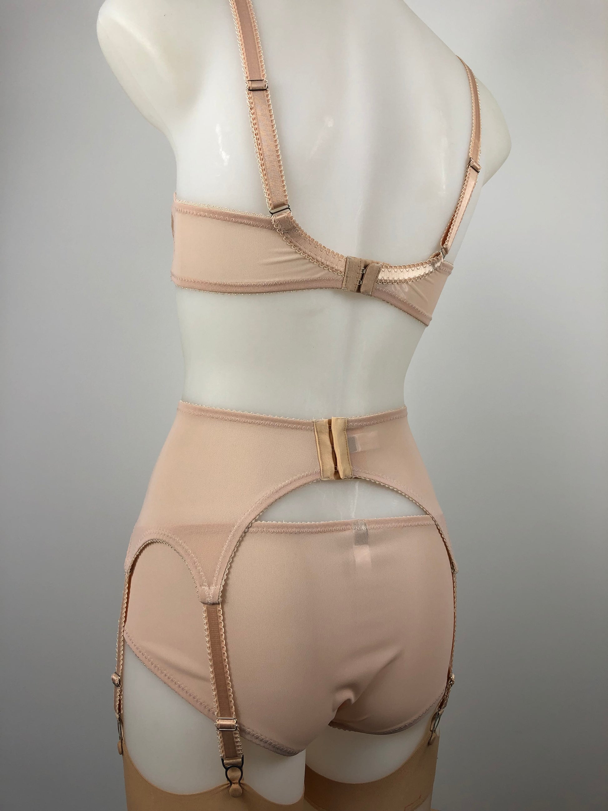 Peachy Beige lace lingerie. 1950s nude faux vintage underwear range odette. Offering longline bra, longline girdle, 6 strap garter belt and pantie girdle high waisted knickers with detachable suspender straps