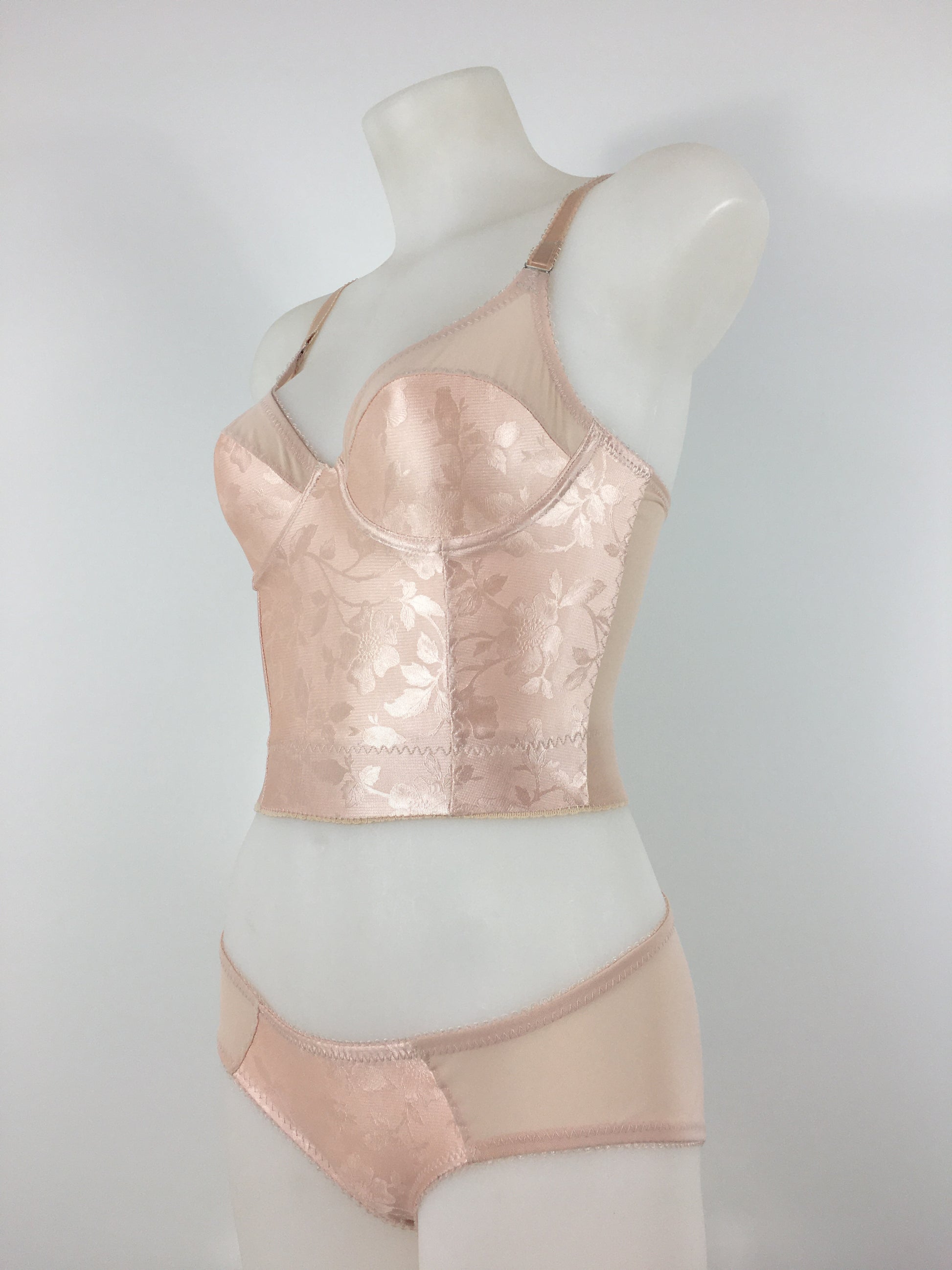 Our most authentic looking vintage inspired lingerie yet. Perfect peachy satin pantie knicker to compliment the other faux vintage lingerie in the clematic range, including longline faux vintage 1950s bra, vintage inspired longline girdle, high waisted pantie girdle and size strap suspender belt