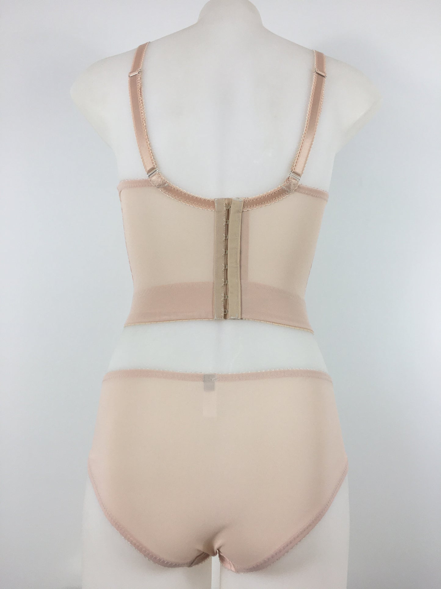 Our most authentic looking vintage inspired lingerie yet. Perfect peachy satin pantie knicker to compliment the other faux vintage lingerie in the clematic range, including longline faux vintage 1950s bra, vintage inspired longline girdle, high waisted pantie girdle and size strap suspender belt