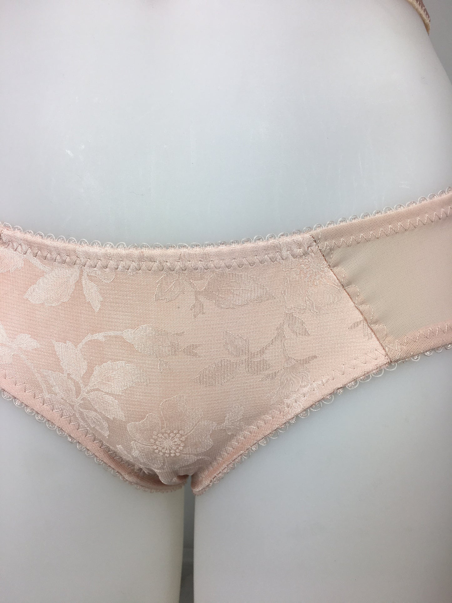 Our most authentic looking vintage inspired lingerie yet. Perfect peachy satin pantie knicker to compliment the other faux vintage lingerie in the clematic range, including longline faux vintage 1950s bra, vintage inspired longline girdle, high waisted pantie girdle and size strap suspender belt