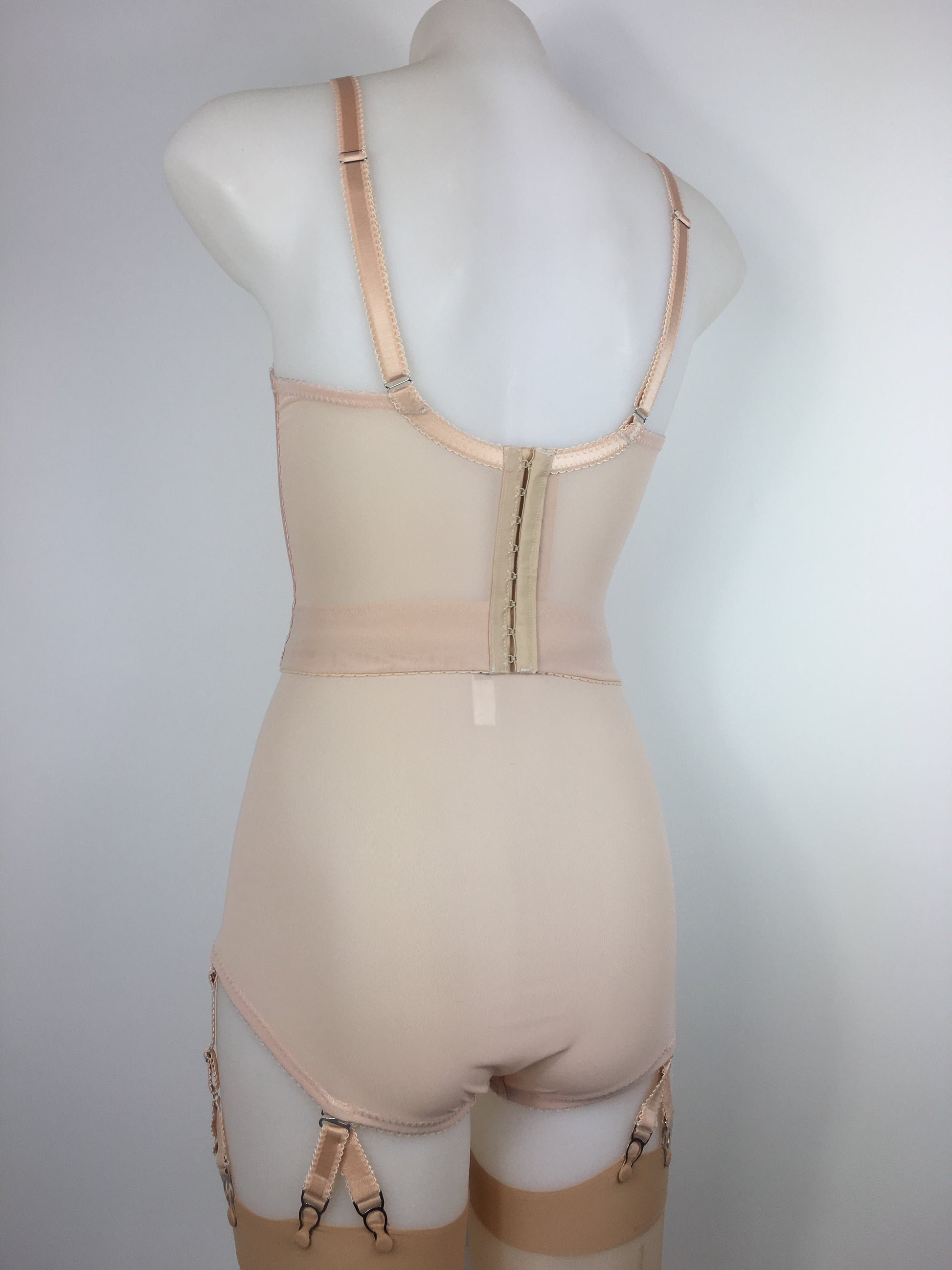 Our most authentic looking vintage inspired lingerie yet. Perfect peachy satin pantie girdle or high waisted knicker with 6 detachable Y straps, characteristic of pip and pantalaimon. Nude big shapewear knickers with garter straps to keep your seamed stockings in place all day. Fabulous faux and reproduction lingerie made in the uk