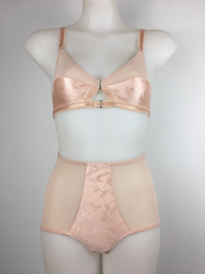 Our most authentic looking vintage inspired lingerie yet. Perfect peachy satin pantie knicker to compliment the other faux vintage lingerie in the clematic range, including longline faux vintage 1950s bra, vintage inspired longline girdle, high waisted pantie girdle and size strap suspender belt