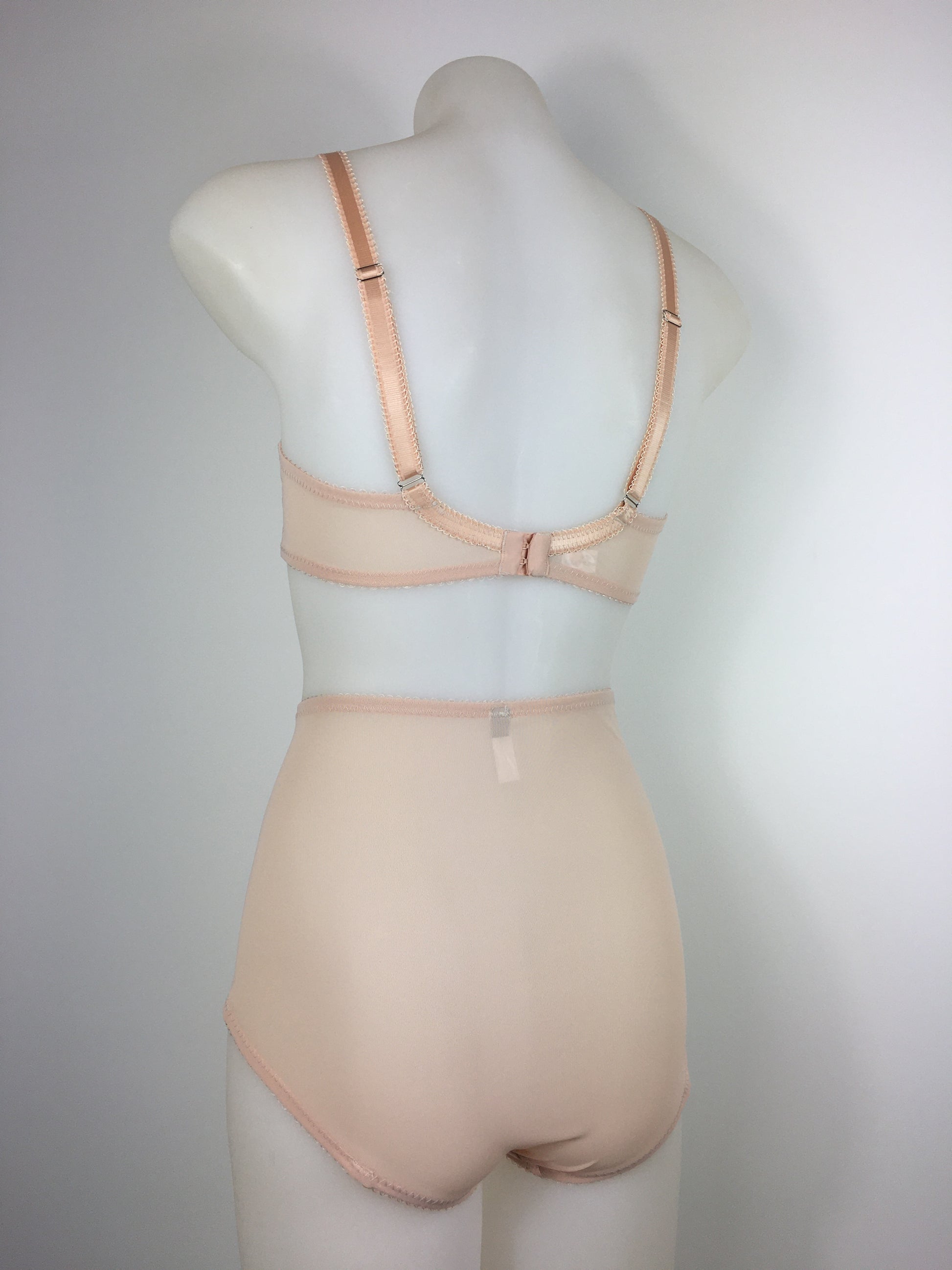 Our most authentic looking vintage inspired lingerie yet. Perfect peachy satin pantie knicker to compliment the other faux vintage lingerie in the clematic range, including longline faux vintage 1950s bra, vintage inspired longline girdle, high waisted pantie girdle and size strap suspender belt
