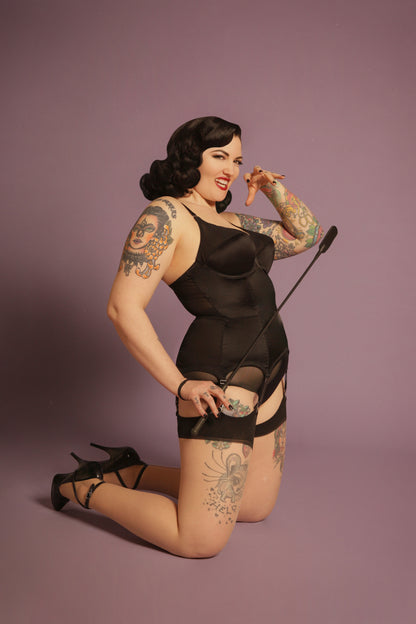 black satin underwired corselette. Six steel suspender straps and elastic waistband. shape wear lingerie made to order in the uk. vintage retro inspired lingerie and underwear by Pip & Pantalaimon 1950s fetish bettie page lingerie corset