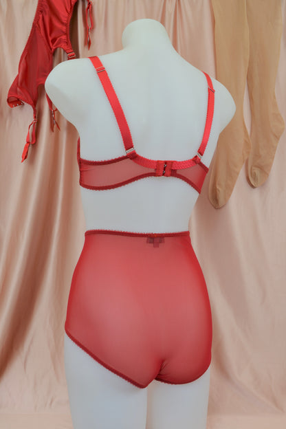 red satin shapewear lingerie. Vintage inspired valentines underwear. Red shapewear satin and red power net underwired bra, six strap suspender belt with steel garter clips and classic cut knicker or high waisted pantie girdle. Custom made red lingerie made to order in the UK. Red satin underwear with no lace. Perfect for Christmas and Valentines