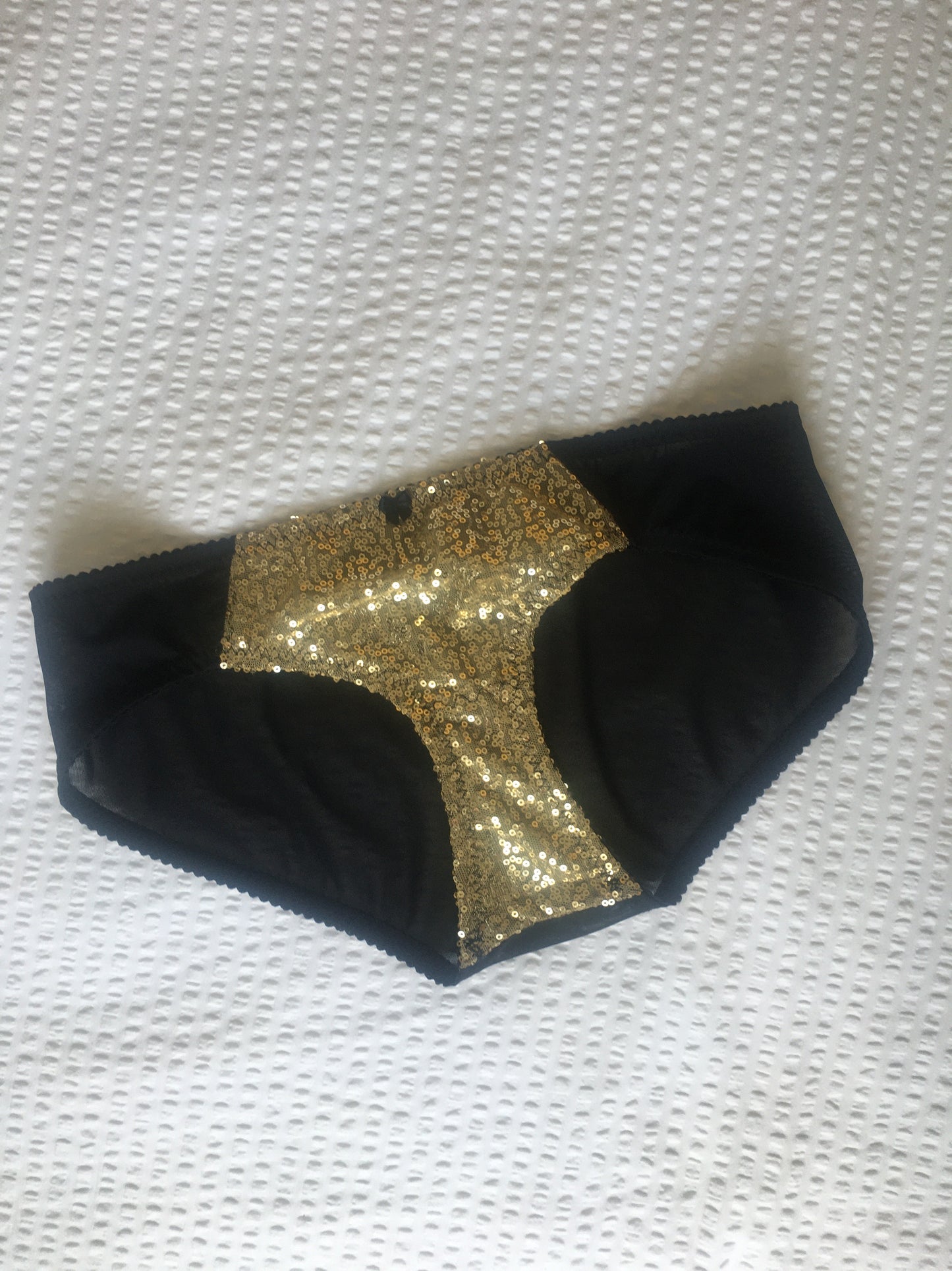 vintage inspired glitter sequin underwear. retro lingerie perfect for burlesque. gold sequin bralette, soft bra glittery showgirl six straps suspender belt and classic cut burlesque pantie knicker by pip and pantalaimon
